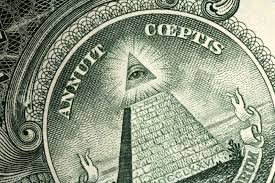 A close up of the eye of god on a dollar bill.