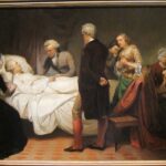 Mourners gathered around a sickbed scene.