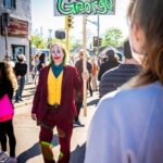 Clown holding "Justice for George" sign.