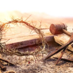 Crown of thorns, nails, and wooden cross.